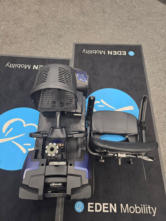 Refurbished Drive Scout Blue mobility scooter with detached black seat on Eden Mobility mat indoors