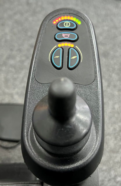 Joystick control with buttons on a grey background