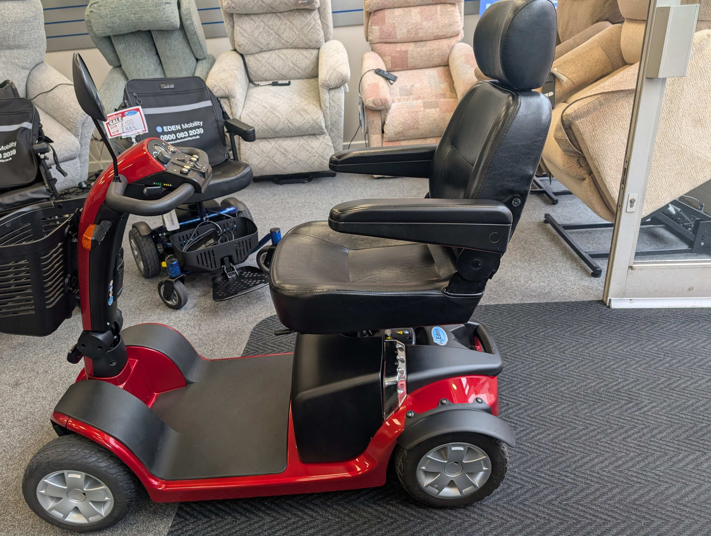 Side of Red Pride Colt Mobility Scooter