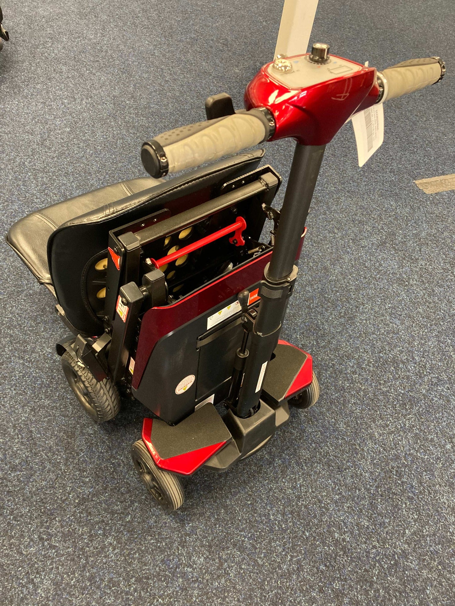 Solax Red mobility scooter folded