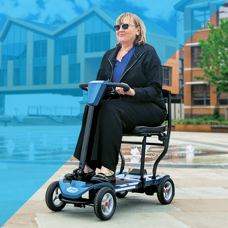 Woman using mobility scooter