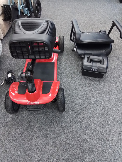 Motion eTravel folded view (red) - Eden Mobility
