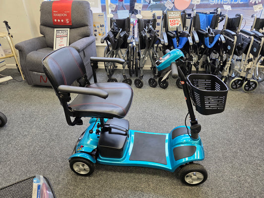 Refurbished Li-tech Air Blue mobility scooter with new batteries displayed in a store with wheelchairs and chairs in background