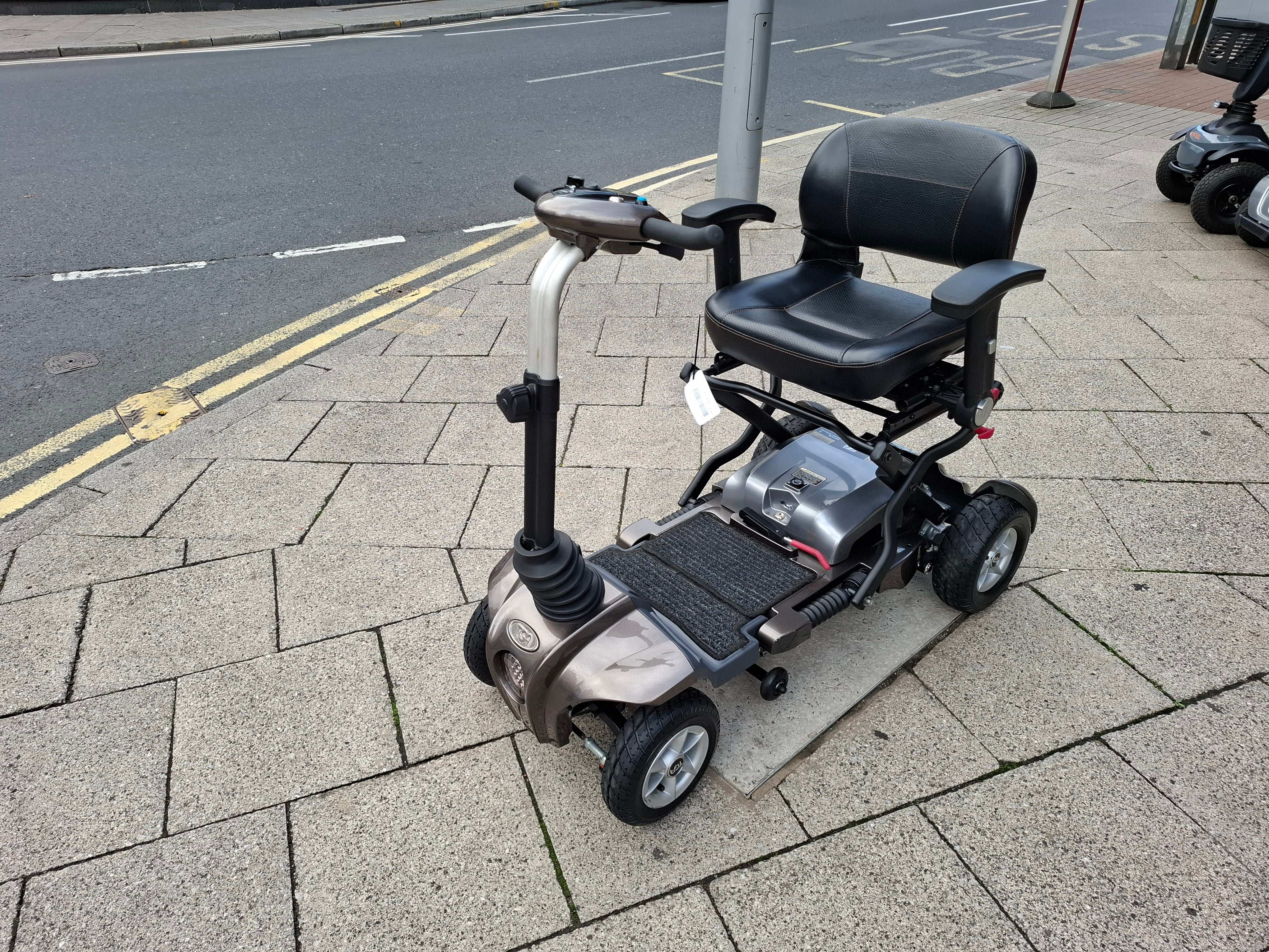 Side view of bronze
TGA Maximo scooter