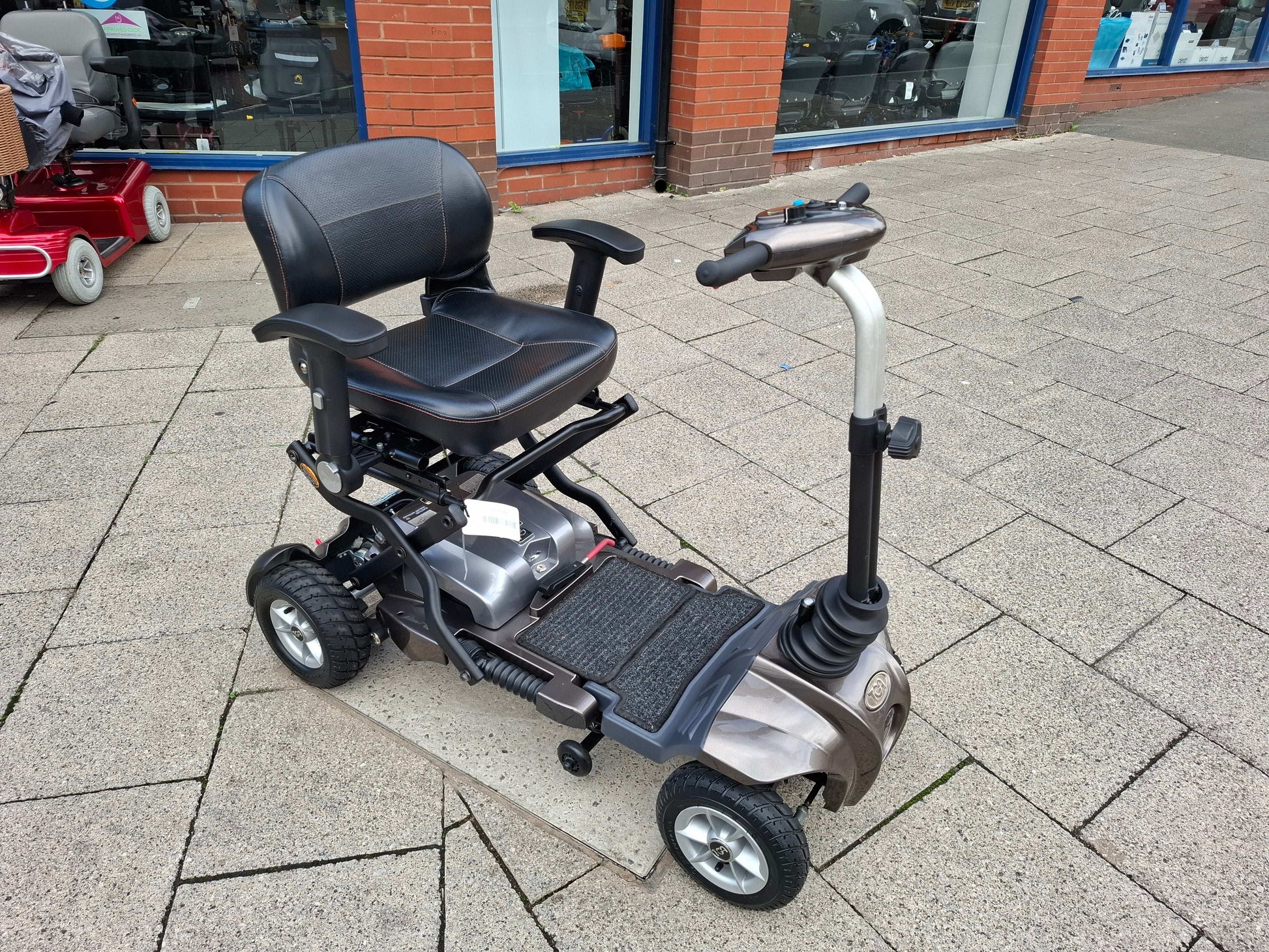Side of TGA Maximo Mobility Scooter In Bronze