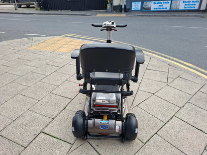 Back of the TGA Maximo mobility scooter in bronze