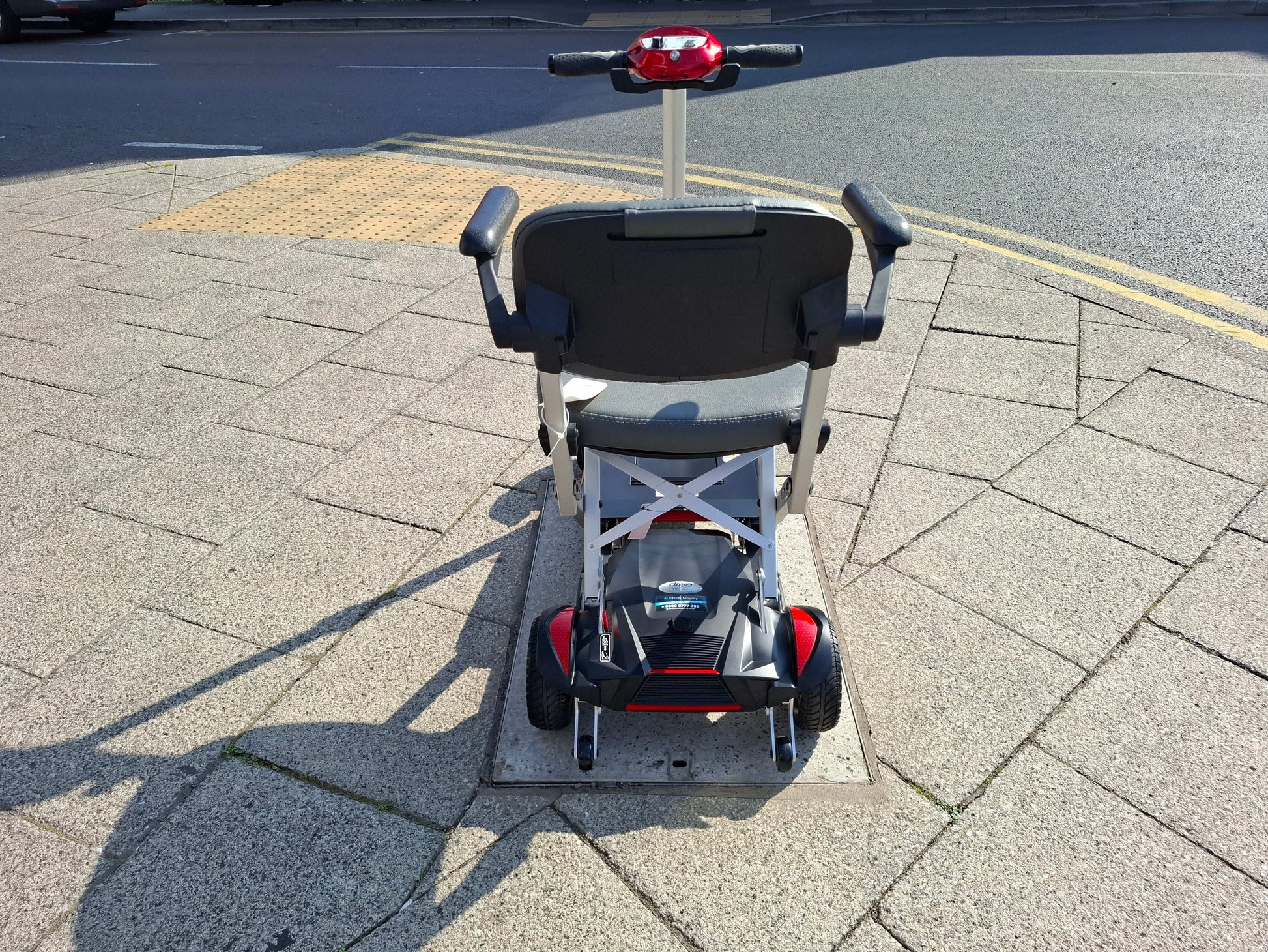 Back Of Drive Autofold Mobility Scooter In Red