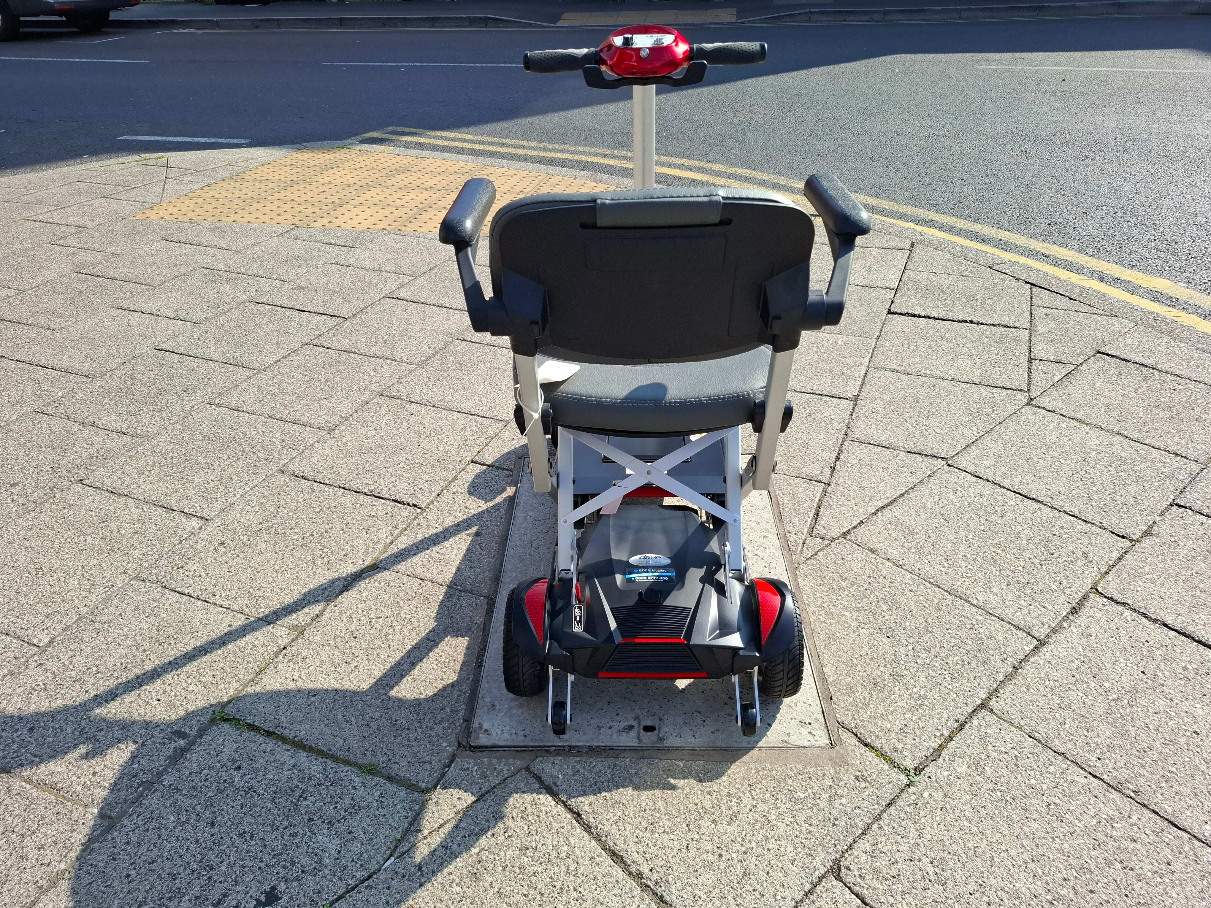 Back Of Drive Autofold Mobility Scooter In Red