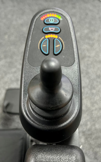 Joystick control with buttons on a grey background