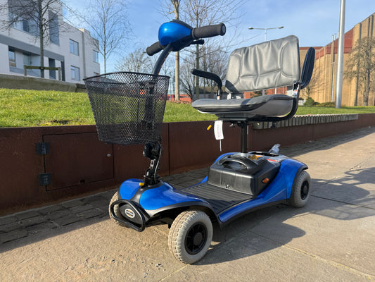 image of second hand mobility scooter on street