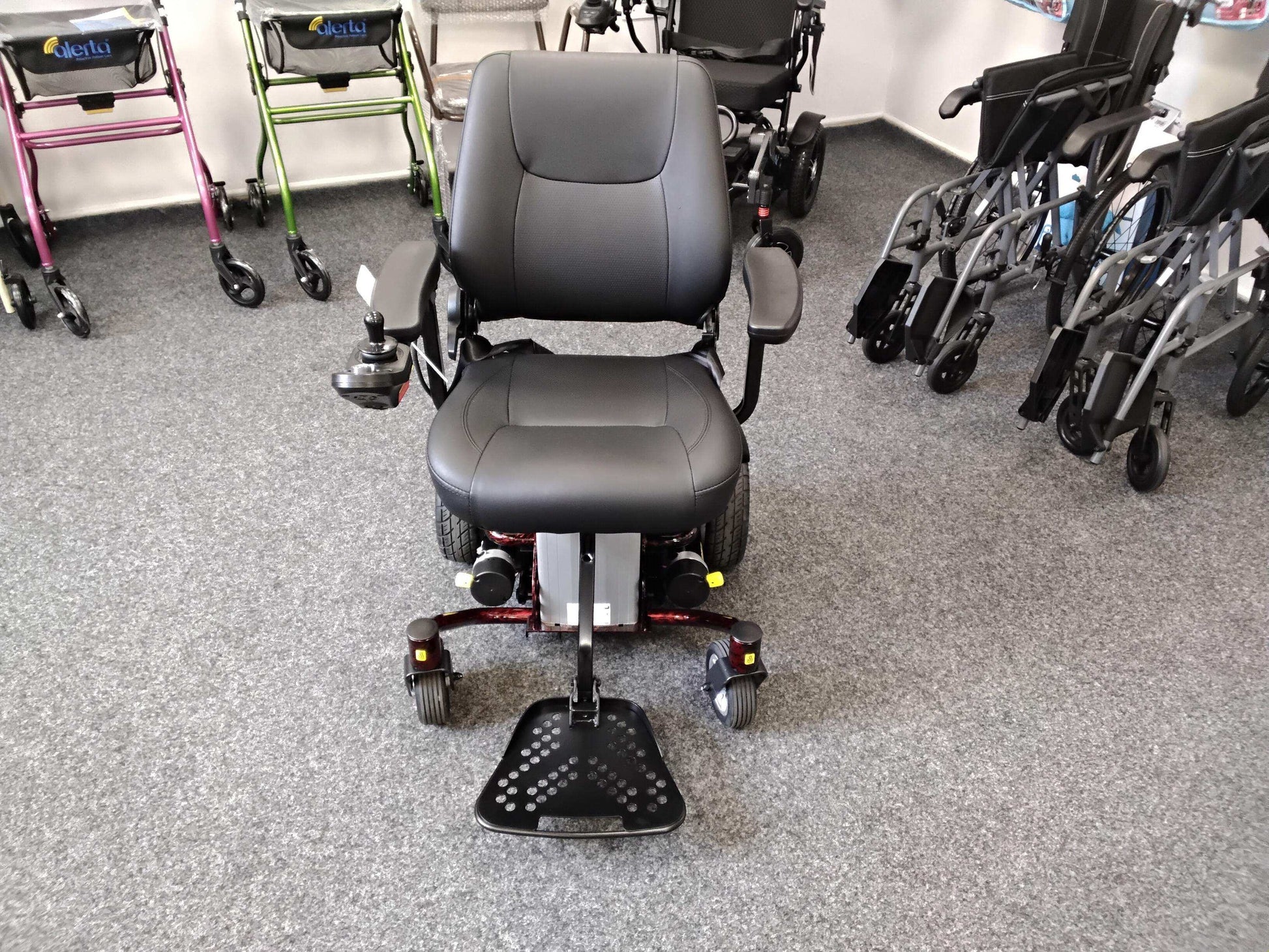 The Roma Reno Lift mobility scooter in showroom