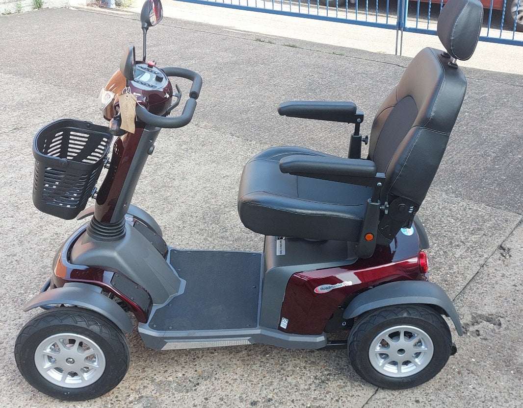 Side of 
Vanos Galaxy 2 Red Mobility Scooter
