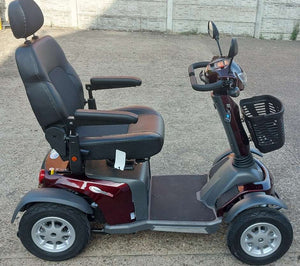 Side view of 
Vanos Galaxy 2 Red Mobility Scooter