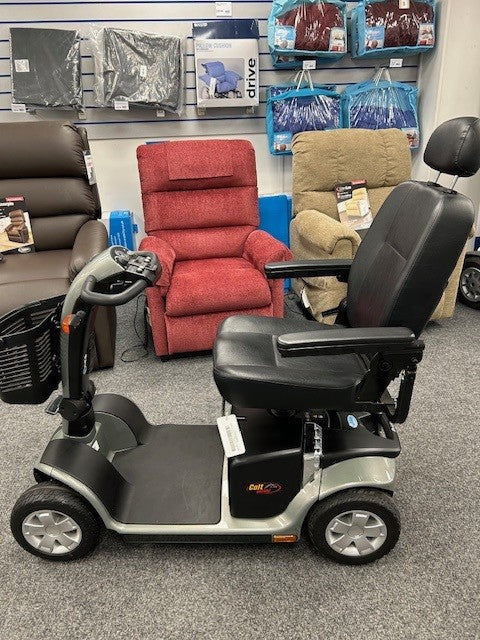 Light Green Pride Colt Deluxe Mobility Scooter in showroom