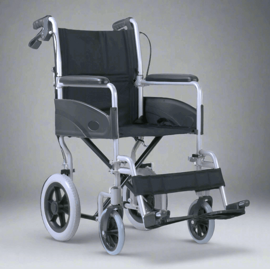 Black and silver manual Excel Access Transit wheelchair on a white background