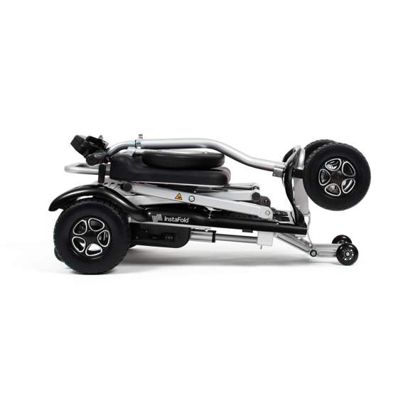 Folded Drive InstaFold automatic folding mobility scooter in compact portable design for easy transport and storage