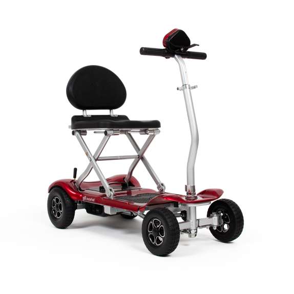 Drive InstaFold automatic folding mobility scooter with black seat and red frame for easy transport and independence