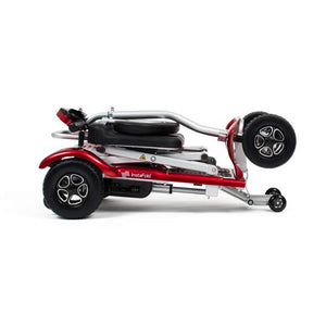 Drive InstaFold automatic folding mobility scooter in compact folded position with red and silver frame design