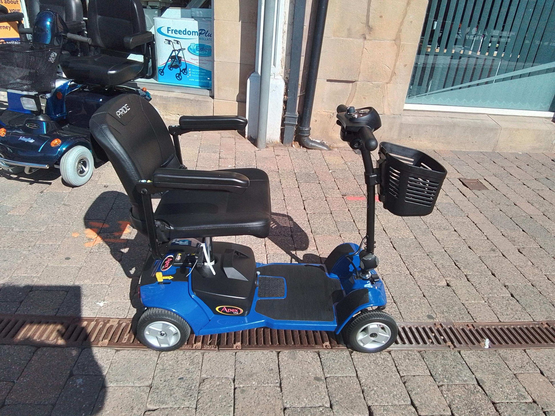Side of Blue Pride Apex Lite Mobility Scooter