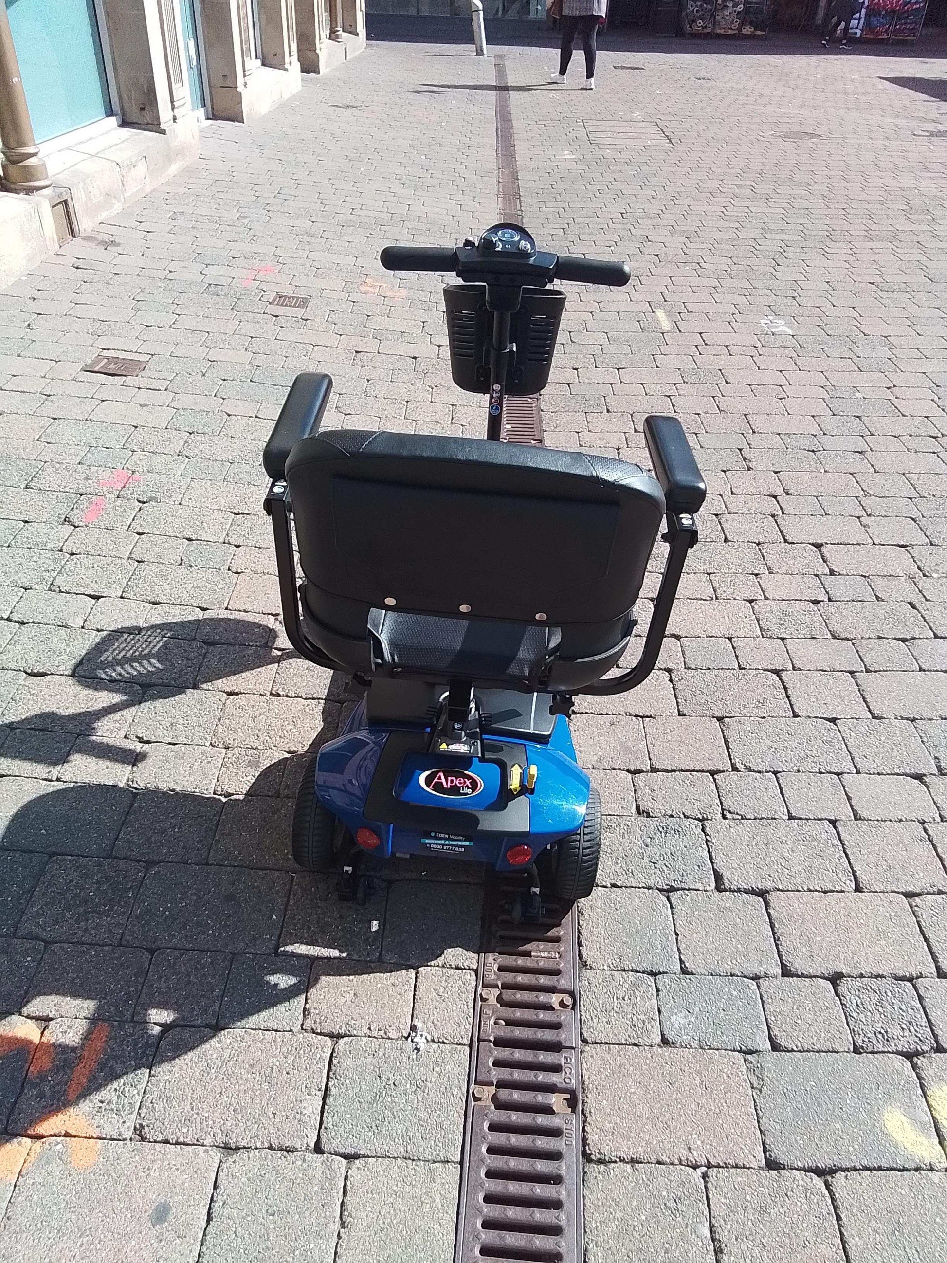 Back of blue Pride Apex Lite Mobility Scooter