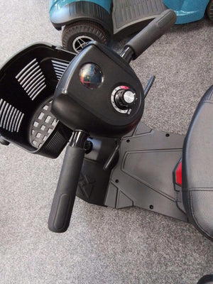 Close up of basket on Drive Compact Lite Mobility Scooter In Red