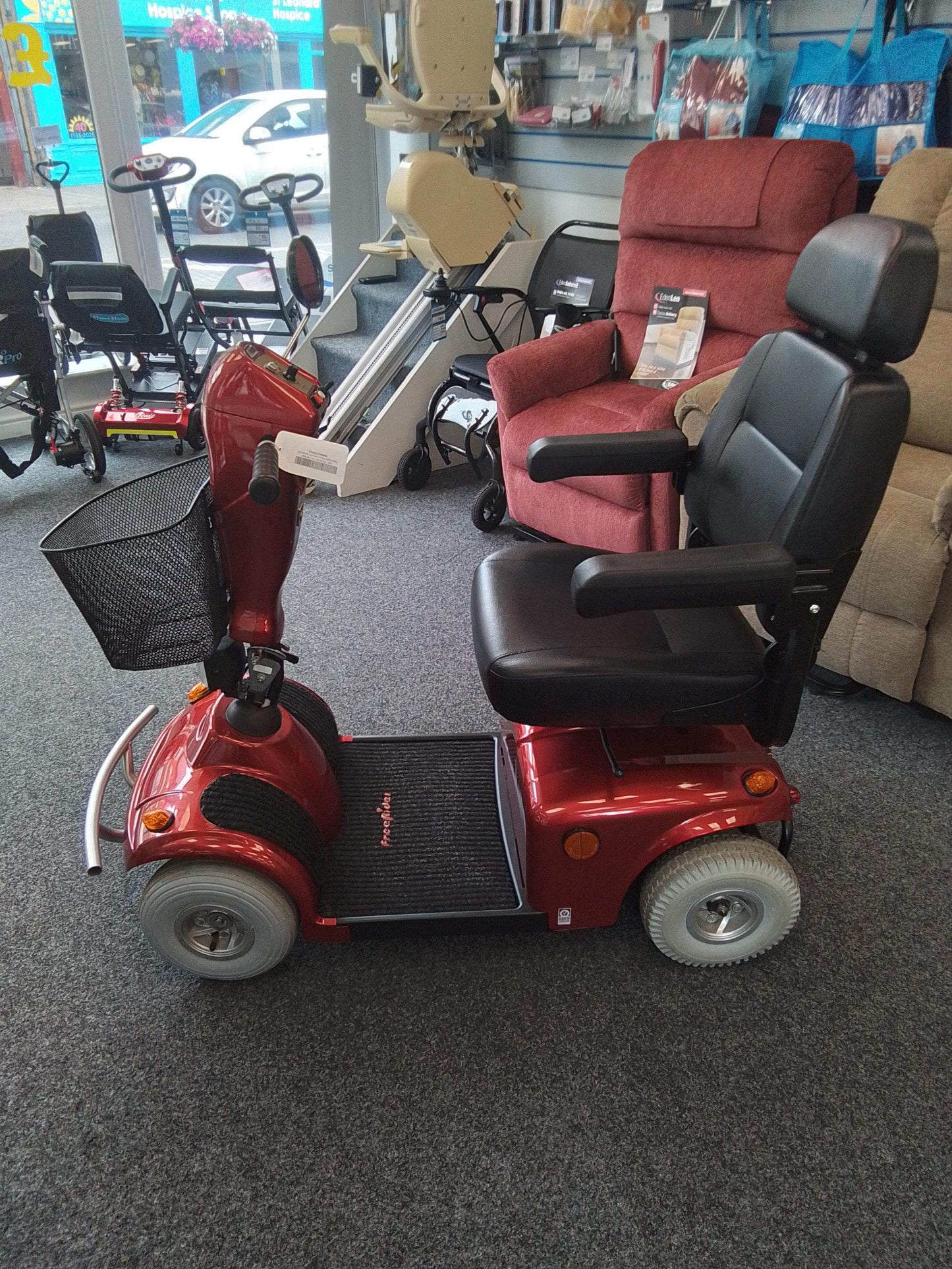 Red Freerider Mayfair Mobility Scooter In Showroom