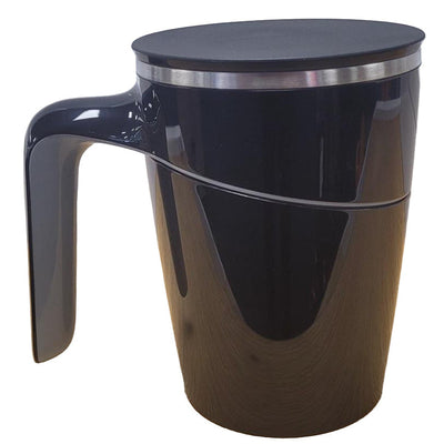 Black mug with a handle on a wooden surface