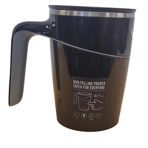 Black mug with a handle and safety label on a white background