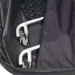Foldable wheelchair inside a black travel bag