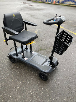 Scooterpac Atom side view (black) - Eden Mobility