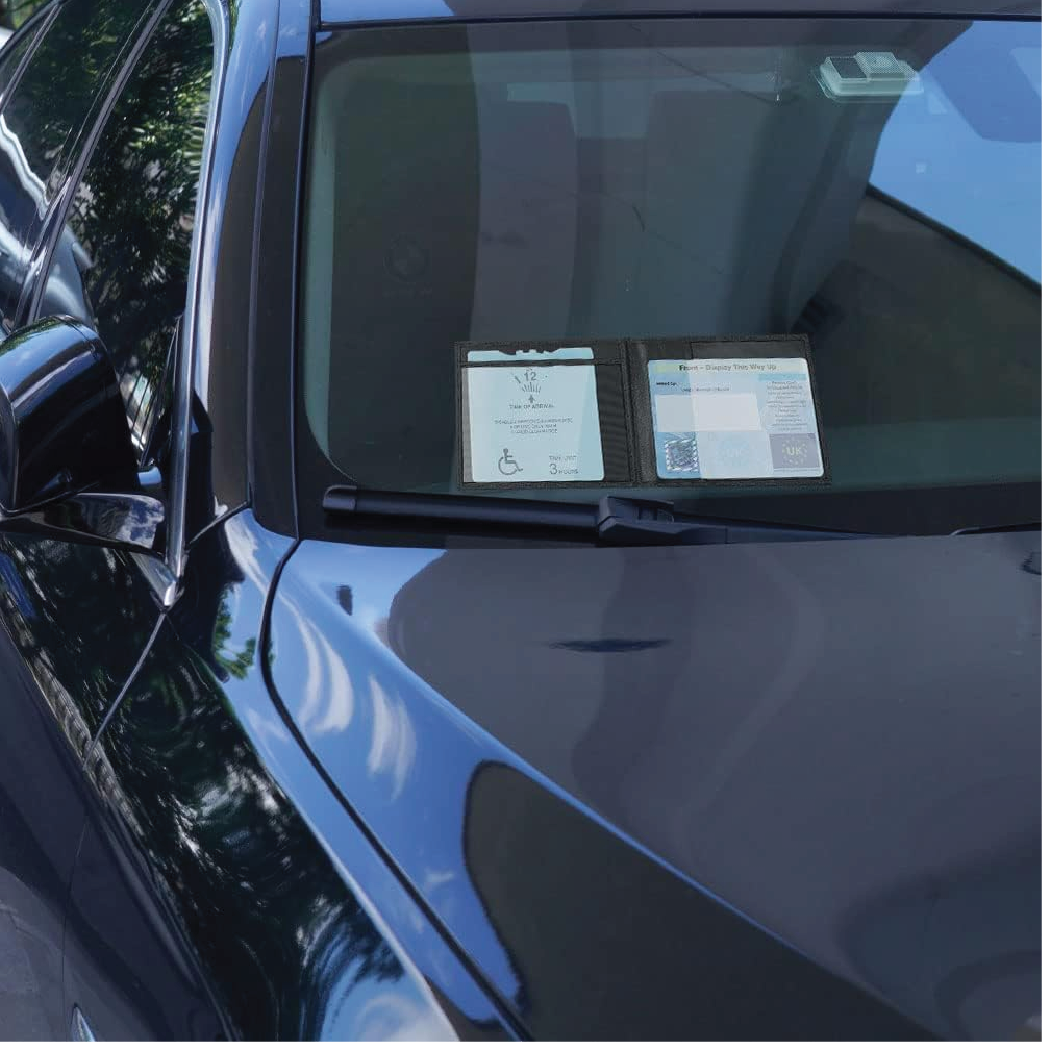 Blue Badge Parking Wallet displayed on a car dashboard with visible UK disability badge and time card inside