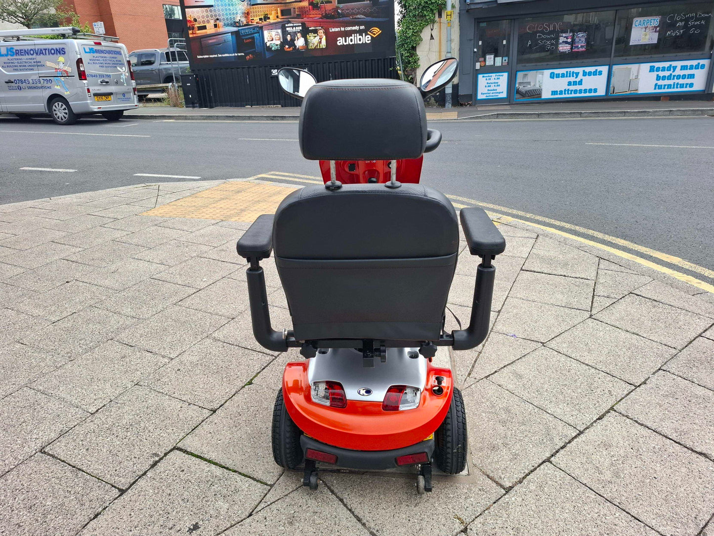Orange Kymco Midi scooter backview