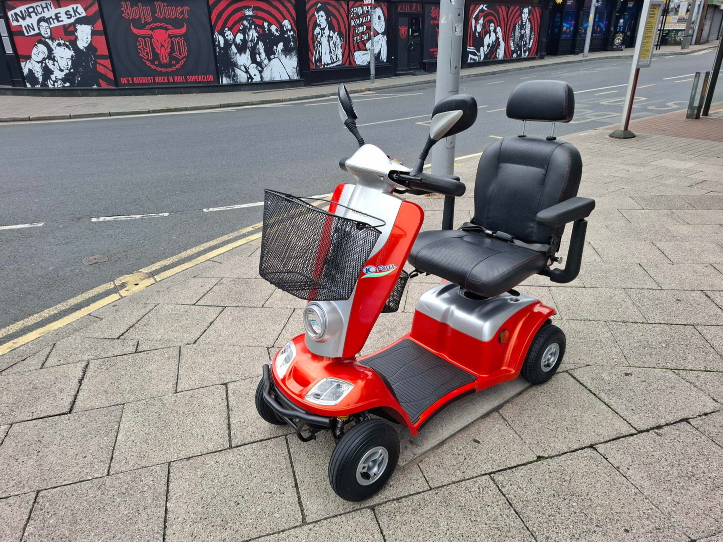 Sideview of Kymco Midi in Orange