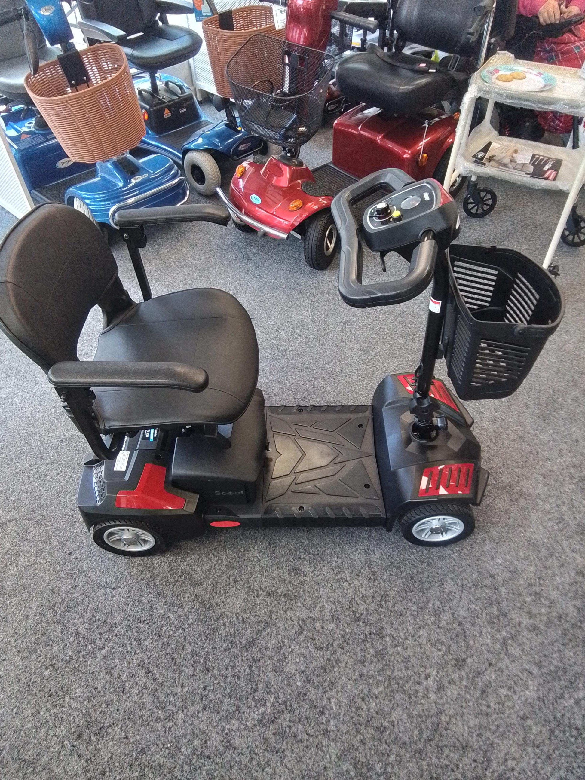Side view of Drive Scout Mobility Scooter In Red